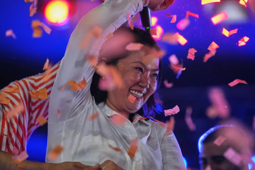 Keiko Fujimori greets supporters as she arrives at a rally in Huacho, Peru, on June 2. Guadalupe Pardo/AP