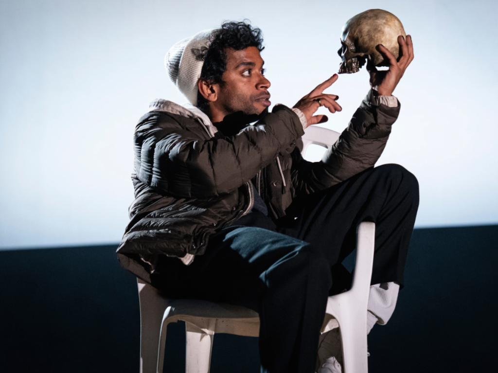 Released by Polk & Co., this photograph captures Hiran Abeysekera performing as Hamlet at London’s National Theatre, on September 25, 2025. The image is credited to Sam Taylor / Polk & Co., and distributed via the Associated Press.