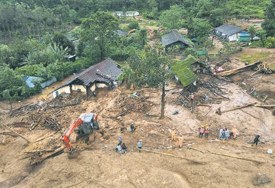 Damaged houses at a landslide site in Wayanad district on Friday. (Reuters)