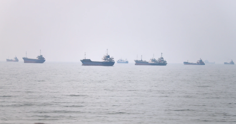 Commercial vessels are seen in the Strait of Hormuz off Bandar Abbas, Iran, Tuesday, June 30, 2026. (Amirhosein Khorgooi/ISNA via AP)