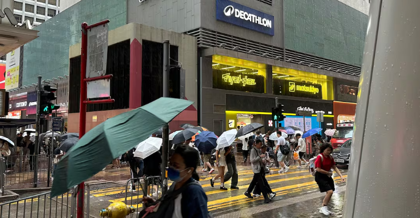 Passersby walk in Hong Kong's Mong Kok AP Photoo