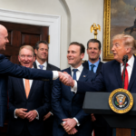 U.S. President Donald Trump shakes hands with Brian Armstrong, Coinbase Co-Founder & Chief Executive Officer, / Photo Reuters