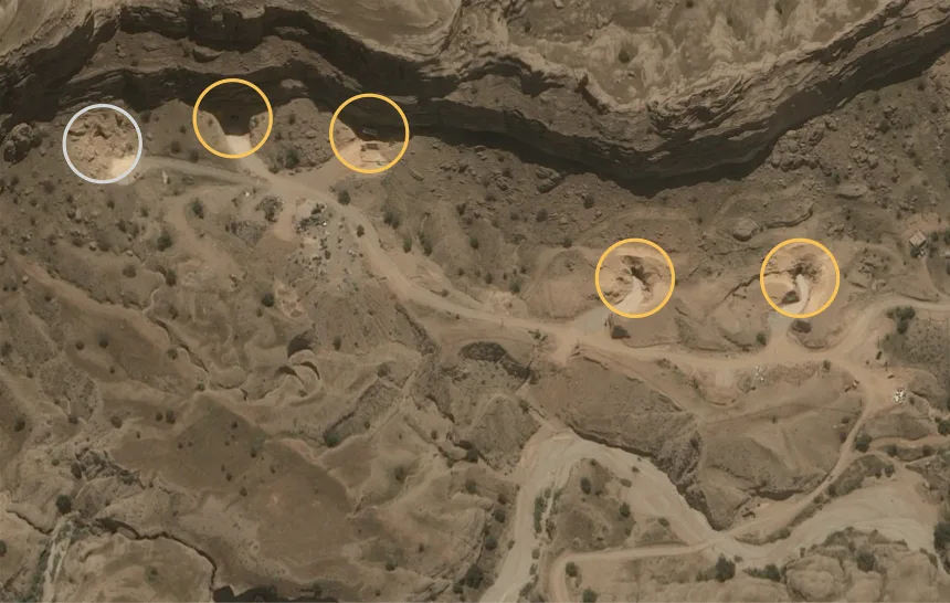At a missile base in Dezful, Iran, four of the five entrances to the underground facility could be seen reopened on May 12. Circled in gray is the one entrance to the complex that remained blocked. Airbus